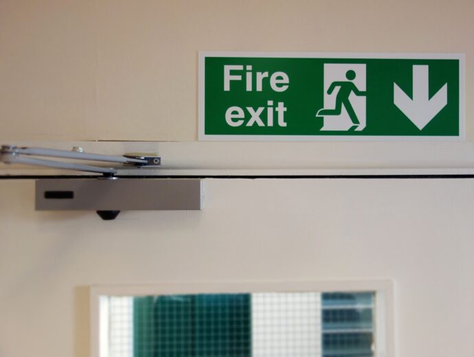 Fire exit signage above fire door